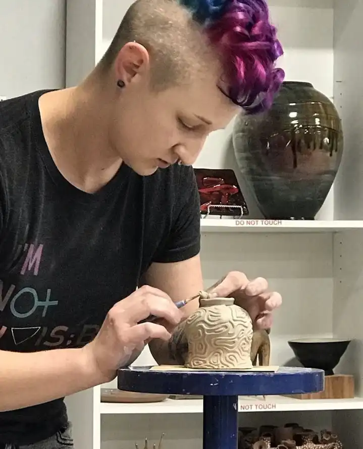 Featured Artist: Shantel Wright-Hancock⁠
⁠
Shantel Wright-Hancock is currently the Ceramic Studio Coordinator at the Lawrence Arts Center. They received their BFA from the University of Wyoming in 2015, and MFA from the University of Kansas in 2019 in ceramic sculpture. They have a background in a variety of materials, but are currently primarily hand-building and slip casting, while participating in 3-4 wood kiln firings a year. They are also a mold maker, and recently created the molds and replications for Mary Sibande's piece Recollected Memory at the Spencer Museum of Art's Bold Women exhibition.