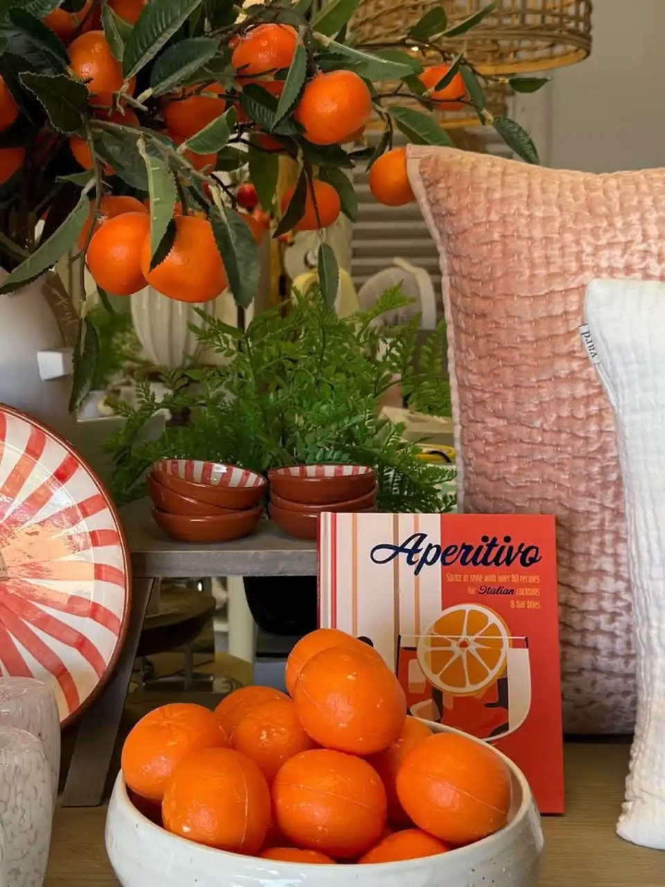How delicious is this image by @adventuresofclobs of our beautiful coral @casacubista pottery, new orange soaps, and clementine branches 🍊🧡🍊🧡🍊🧡