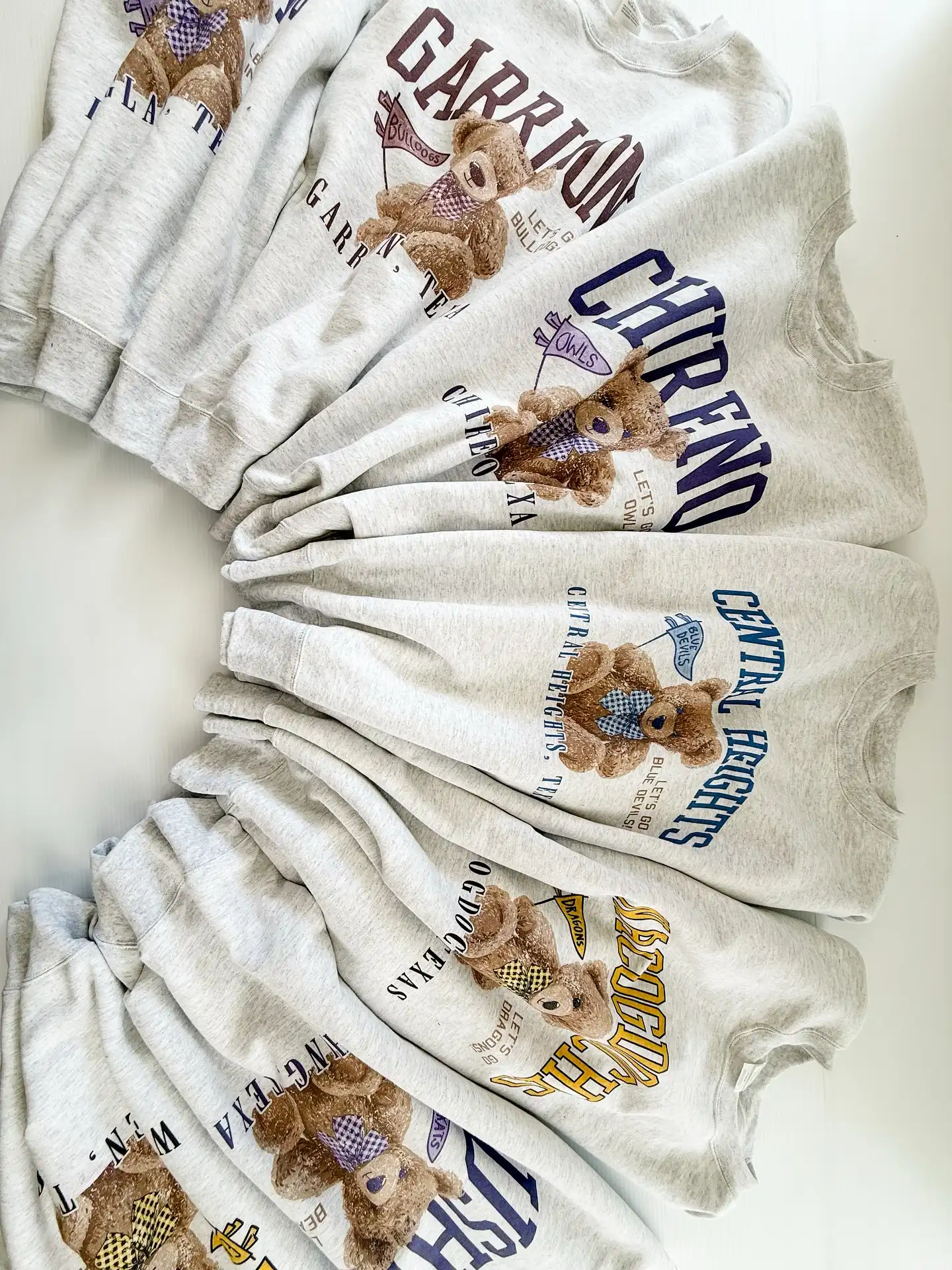 🧸📣 SMALL TOWN. BIG SPIRIT. CUTE SWEATSHIRT.
We brought the hometown pride and stitched it into something actually adorable.
These teddy bear graphic crews are custom for your school: Local love included for:
📍 Nacogdoches
📍 Central Heights
📍 Woden
📍 Cushing
📍 Chireno
📍 Douglass
📍 Garrison
Pre-orders close on July 31 online only at shoptsbnac.com
Cozy up in something that feels like hometown hugs.
#BackToSchoolWithHeart #TSBexclusive #HometownPride #TexasSchools #TeddyLove #SpiritSeason #MadeForYou #TexasSizeBling #PreOrderAlert #LocalLove
