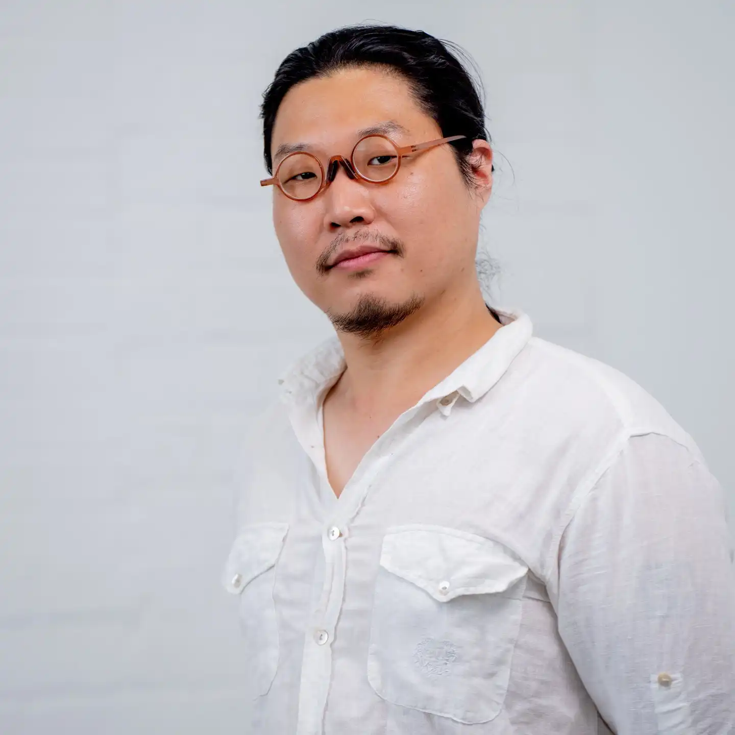 Huey Lee
My artistic practice is deeply rooted in my cultural background, religious influences, and nostalgic memories. I express these themes through drawings and sculptures, each possessing its own narrative. These narratives are conveyed through unique characters that serve as a vessel for personal introspection and societal messages, often encapsulating hidden desires and concealed emotions. Utilizing whimsical humor, my work often includes nostalgic figures and objects that evoke sentimental responses in viewers.
Central to my artistic process is an ongoing exploration of self. Constant self-inquiry regarding my identity allows me to delve into diverse narratives through these characters. They represent the spectrum of my emotional landscape, influenced by both internal and external factors such as trauma, anxiety, longing, and desire.
My drawings and sculptures serve as a visual diary, reflecting the spectrum of emotions I experience daily. Often, I incorporate found objects into my work, not only to introduce a new visual language but also to underscore the original narratives. These found objects fuel my imagination, resulting in a fusion of elements that create visual complexity.
The characters created in my imagination, such as a dog, tiger, demon, angel, super-manized Huey, etc., are translated into clay works, embodying both figures and illustrations. These clay figures and illustrations bring forth a humorous and whimsical narrative by seamlessly combining cultural contexts like pop and Korean culture. For instance, a dog disguised as a tiger, pretending to be something it's not, reflects aspects of myself—moments when I may not feel strong, yet push myself to be seen as mighty.
Clay has been a timeless medium, offering a profound means of expression. Objects crafted from clay throughout history not only signify the culture from which they originate but also reflect the zeitgeist. Clay, with its unique ability to capture the maker's bodily trace, becomes a medium through which I share my emotions, memories, and languages, aiming to communicate with the world.
Website: Hueyleearts.com